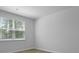 Bright bedroom featuring neutral paint, large window with blinds and vinyl wood-look flooring at 1036 Forrest Creek Dr, Summerville, SC 29483
