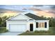 Charming single-story home with a clean white exterior, attached garage, and inviting entrance at 1036 Forrest Creek Dr, Summerville, SC 29483