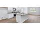 Modern kitchen features white cabinets, granite countertops, stainless steel appliances and island at 1036 Forrest Creek Dr, Summerville, SC 29483