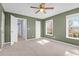 Spacious bedroom featuring multiple windows and a doorway to another room at 105 Thousand Oaks Cir, Goose Creek, SC 29445
