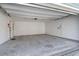 Spacious garage interior featuring concrete floors and white walls at 105 Thousand Oaks Cir, Goose Creek, SC 29445