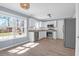 Bright kitchen featuring stainless steel appliances, granite counters and a large window overlooking the backyard at 105 Thousand Oaks Cir, Goose Creek, SC 29445