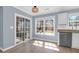 Kitchen area with sliding glass door, stainless steel dishwasher, and granite counters at 105 Thousand Oaks Cir, Goose Creek, SC 29445