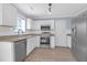 Modern kitchen with stainless steel appliances, white cabinets, and granite countertops at 105 Thousand Oaks Cir, Goose Creek, SC 29445