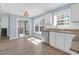 Kitchen area with sliding glass door, stainless steel dishwasher, and granite counters at 105 Thousand Oaks Cir, Goose Creek, SC 29445