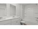 A modern bathroom boasts dual sinks, a shower and tub combo, and sleek fixtures at 1054 Forrest Creek Dr, Summerville, SC 29483