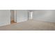 A bright bedroom features neutral carpeting and an entrance to an adjacent room at 1054 Forrest Creek Dr, Summerville, SC 29483