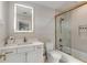 Well-lit bathroom with white cabinetry, quartz countertop, gold hardware and a shower featuring glass doors at 1126 Ocean Forest Lane, 1/8 Share, Seabrook Island, SC 29455