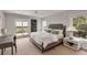 Inviting bedroom featuring a plush bed, and scenic outdoor views, creating a serene retreat at 1126 Ocean Forest Lane, 1/8 Share, Seabrook Island, SC 29455