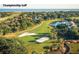 Scenic aerial view of a championship golf course with sand traps and lush green fairways at 1126 Ocean Forest Lane, 1/8 Share, Seabrook Island, SC 29455