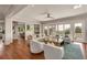 Spacious living room featuring hardwood floors, neutral tones, and an open layout, perfect for relaxation and entertaining at 1126 Ocean Forest Lane, 1/8 Share, Seabrook Island, SC 29455