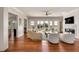 Bright and airy living room featuring a fireplace, large windows, and comfortable seating, ideal for relaxation at 1126 Ocean Forest Lane, 1/8 Share, Seabrook Island, SC 29455