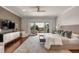 Spacious main bedroom with balcony access, stylish decor, and plenty of natural light at 1126 Ocean Forest Lane, 1/8 Share, Seabrook Island, SC 29455