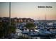 Picturesque marina view showcasing boats, piers, and waterfront homes at sunset at 1126 Ocean Forest Lane, 1/8 Share, Seabrook Island, SC 29455