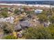 Beautiful aerial view captures waterfront property with stunning landscaping, spacious yards, and lush trees at 12 Broughton Rd, Charleston, SC 29407