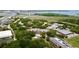 Aerial view of a stunning property with lush greenery and waterways in the background at 12 Broughton Rd, Charleston, SC 29407