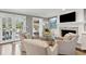 Inviting living room featuring a fireplace with decorative mantel and neutral-toned furnishings at 12 Broughton Rd, Charleston, SC 29407