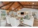 Spacious living room showcasing a vaulted ceiling, wooden ceiling and built-in shelving at 12 Broughton Rd, Charleston, SC 29407