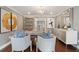 Charming office with hardwood floors, chandelier, contemporary decor, and ample storage at 12 Broughton Rd, Charleston, SC 29407