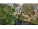 Backyard aerial view of manicured lawn, with access to a lake at 1208 Wynnwood Ct, Mount Pleasant, SC 29464