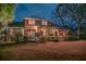 Spacious backyard with outdoor seating, a well-maintained lawn, and mature trees at 1208 Wynnwood Ct, Mount Pleasant, SC 29464