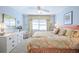 Comfortable bedroom featuring floral bedding, light blue walls, a dresser, and neutral carpeting at 1208 Wynnwood Ct, Mount Pleasant, SC 29464