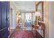 Inviting foyer featuring hardwood floors, elegant furnishings, and a view into the living area at 1208 Wynnwood Ct, Mount Pleasant, SC 29464