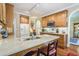 Functional kitchen with wooden cabinets, marble countertops, and modern appliances at 1208 Wynnwood Ct, Mount Pleasant, SC 29464