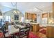 Open kitchen with adjacent living area, stainless appliances, and ample seating at 1208 Wynnwood Ct, Mount Pleasant, SC 29464