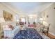 Cozy living room with hardwood floors, archway to dining room, and elegant furniture at 1208 Wynnwood Ct, Mount Pleasant, SC 29464