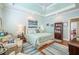 Inviting main bedroom boasts tray ceilings, plantation shutters, and a calming color palette at 1208 Wynnwood Ct, Mount Pleasant, SC 29464