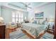 Serene main bedroom with hardwood floors, tray ceiling, and coordinated decor at 1208 Wynnwood Ct, Mount Pleasant, SC 29464