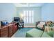 Inviting home office featuring comfortable seating, hardwood floors, and ample natural light from a window at 1208 Wynnwood Ct, Mount Pleasant, SC 29464