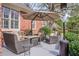 Cozy patio with comfortable seating, umbrella, and heater for relaxing outdoor entertainment at 1208 Wynnwood Ct, Mount Pleasant, SC 29464