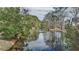 Scenic water view showcasing the tranquil beauty of a pond surrounded by trees at 1208 Wynnwood Ct, Mount Pleasant, SC 29464