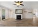 The living room features wood flooring, a fireplace, and recessed lighting, creating a welcoming and well-lit atmosphere at 1216 Hammrick Ln, Johns Island, SC 29455