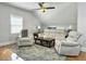 Cozy living room with hardwood floors, comfortable seating, and natural light at 127 Beresford Creek St, Charleston, SC 29492