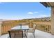 Comfortable balcony seating offers serene views of the coast and neighborhood at 1340 Pelican Watch Villas, Seabrook Island, SC 29455