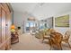Spacious living room with vaulted ceilings and access to a serene balcony at 1340 Pelican Watch Villas, Seabrook Island, SC 29455