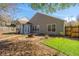 Backyard featuring a patio, fence, artificial turf, and fire pit at 140 Moon Shadow Ln, Summerville, SC 29485
