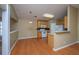 Inviting kitchen with wooden cabinets and modern appliances, adjacent to a dining area at 140 Moon Shadow Ln, Summerville, SC 29485