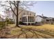 Large backyard with screened-in porch and patio with outdoor seating at 1441 Thayer Pl, Mount Pleasant, SC 29466