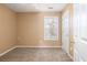 Empty bedroom with neutral paint, carpet, and a large window at 1441 Thayer Pl, Mount Pleasant, SC 29466