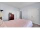 View of the light and airy bedroom, featuring hardwood furnishings and double closets at 1473 Coopers Hawk Dr, Hanahan, SC 29410
