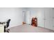 Bedroom with carpet, and a study area with a desk, bookcase, and rolling office chair at 1473 Coopers Hawk Dr, Hanahan, SC 29410