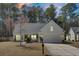 Charming single-story home with well-maintained lawn, two-car garage and inviting curb appeal at 1473 Coopers Hawk Dr, Hanahan, SC 29410