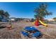 Well-equipped community playground with picnic tables, perfect for Gathering gatherings and outdoor fun at 1473 Coopers Hawk Dr, Hanahan, SC 29410