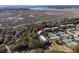 Beautiful aerial view of property showcasing nearby tennis courts and waterway access at 1614 Live Oak Park, Seabrook Island, SC 29455