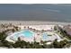 Beautiful aerial view showcases the pools, beach, and clubhouse amenities at 1614 Live Oak Park, Seabrook Island, SC 29455