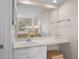 Bathroom vanity with a sink, white cabinetry, and a mirror at 1614 Live Oak Park, Seabrook Island, SC 29455